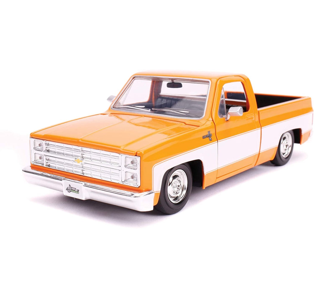 Jada Toys Just Trucks 1:24 1985 Chevrolet C-10 Die-cast Car Orange